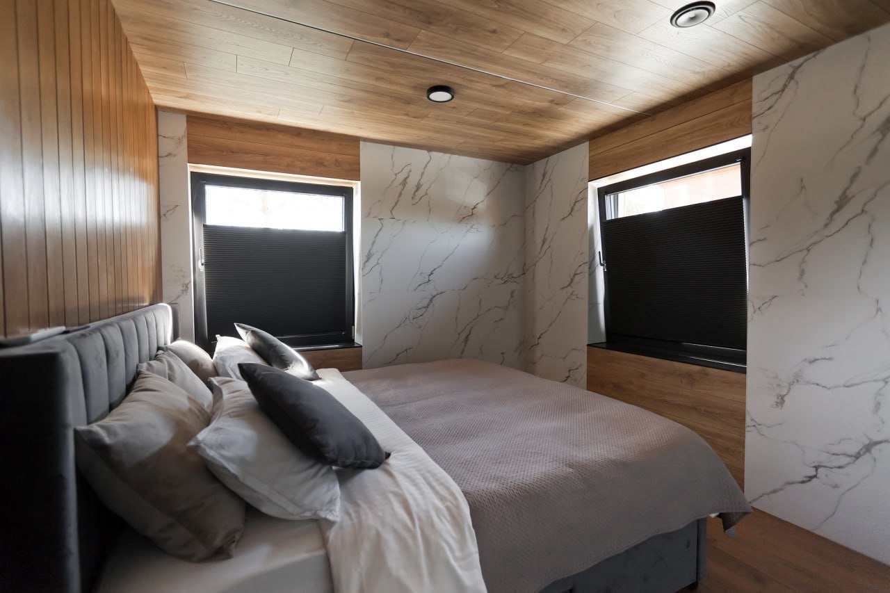 Vacation home in Saaremaa, Kuressaare. Bedroom with a king-size bed.